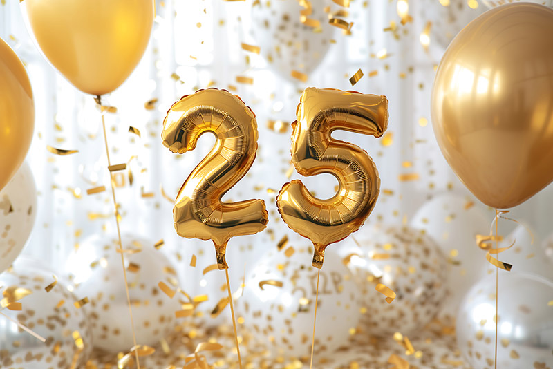 Balloons in the shape of a 25