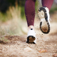 Close up of someone running along a track