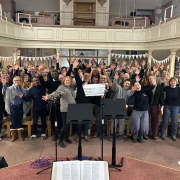 Oxford gospel choir performing in town hall