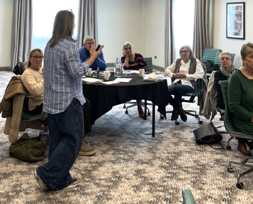 Group of volunteer support workers training