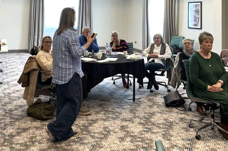 Group of volunteer support workers training