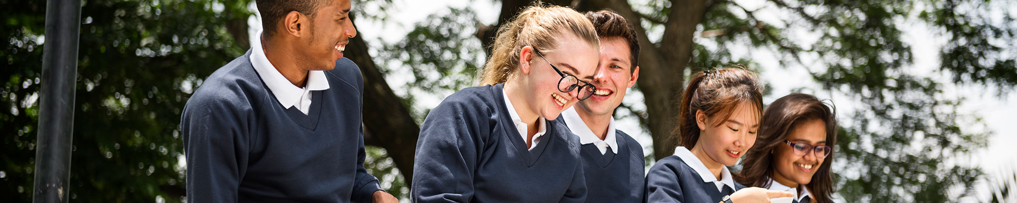 Teenager at school smiling together